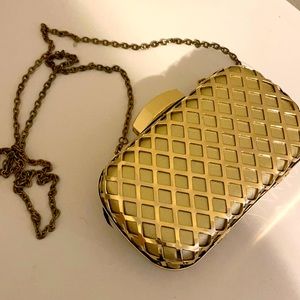 Gold clutch with chain strap metallic